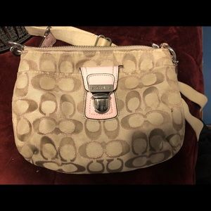 Tan and pink coach cross body purse